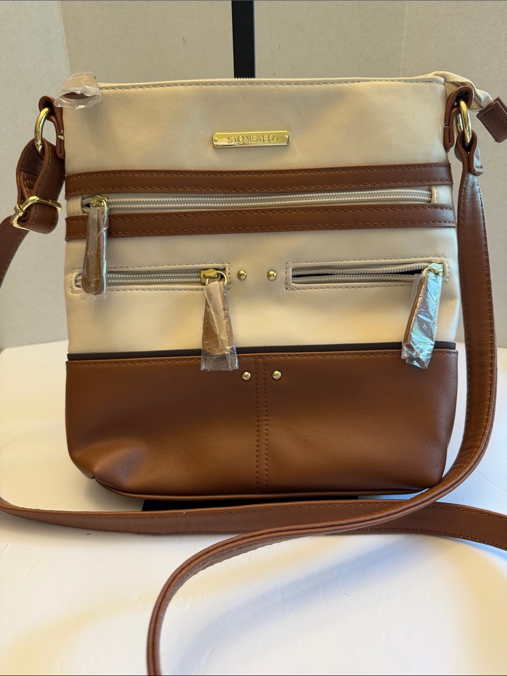 Stone & Co. Cream and Brown Crossbody with Gold Accents